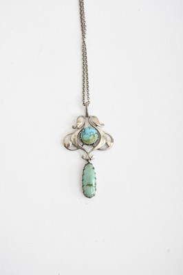 Lot 576 - An Art Nouveau silver and turquoise pendant...