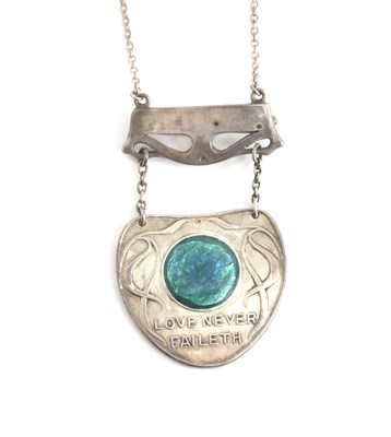 Lot 555 - A Liberty & Co silver and enamel pendant...