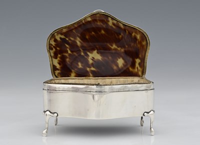 Lot 300 - A George V silver and tortoiseshell jewellery...