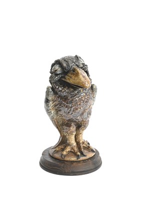 Lot 40 - A Martin Brothers stoneware bird jar and cover...