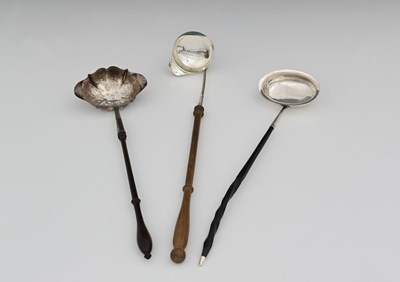 Lot 280 - Three toddy ladles with turned handles, to...