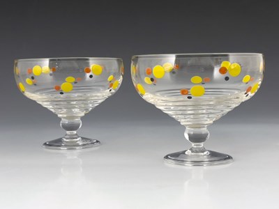 Lot 517 - Stuart and Sons, a pair of Art Deco enamelled...