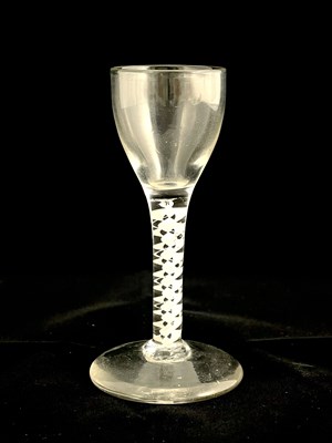 Lot 452 - An opaque and air twist wine glass, circa 1760,...