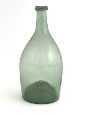 Lot 460 - A small green glass bottle, 18th century,...