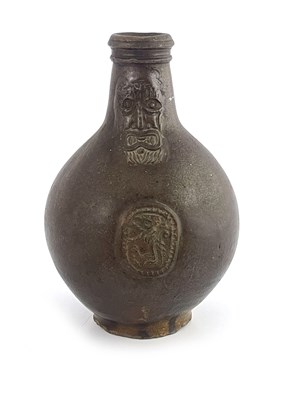 Lot 1026 - A salt glazed stoneware Bartmankrugg or...