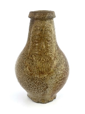 Lot 1027 - A small salt glazed stoneware Bartmankrugg or...