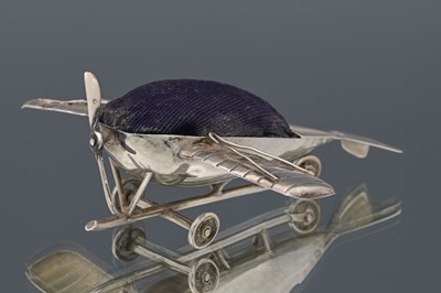 Lot 83 - A George V silver novelty pin cushion, by S...