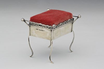 Lot 78 - An Edwardian silver novelty combination...