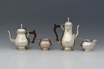 Lot 181 - An Elizabeth II silver four-piece tea and...