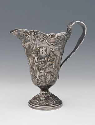 Lot 7 - A Continental plated metal ewer, unmarked,...