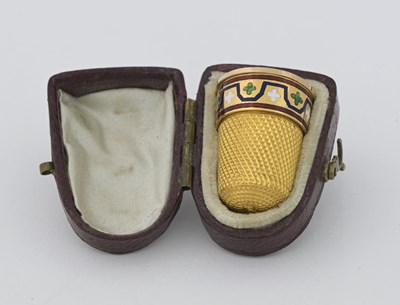 Lot 241 - A nineteenth-century gold and enamel thimble,...
