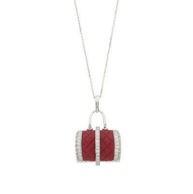 Lot 214 - A brilliant-cut diamond and red gem handbag locket pendant and chain