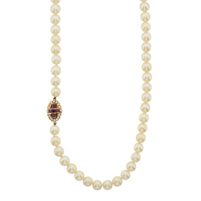 Lot 61 - A cultured pearl single-strand necklace, with ruby and brilliant-cut diamond clasp
