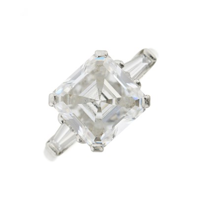 Lot 189 - Graff, a square emerald-cut diamond ring, with tapered baguette-cut shoulders