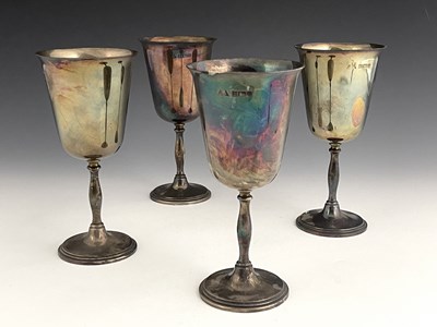 Lot 38 - A set of four Elizabeth II silver goblets,...