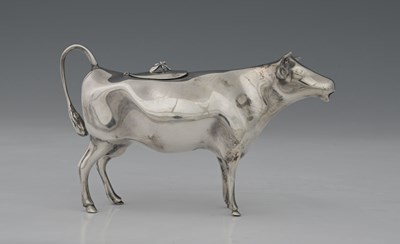 Lot 45 - An Elizabeth II cast silver novelty cow...