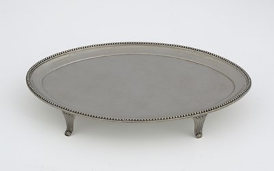 Lot 222 - A George III silver teapot stand, by Peter and...