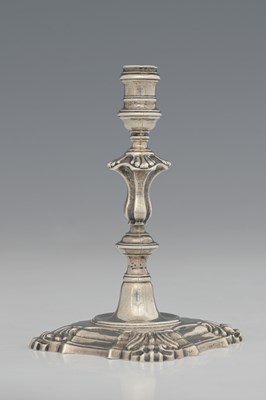 Lot 233 - A George II silver cast taperstick, by John...