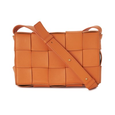 Lot 296 - Bottega Veneta, an orange Cassette crossbody handbag.