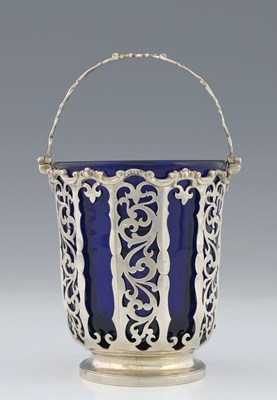 Lot 254 - A Victorian silver swing handle basket, by...
