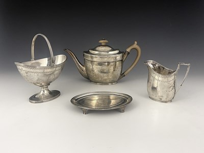 Lot 110 - A George III silver four-piece tea service,...
