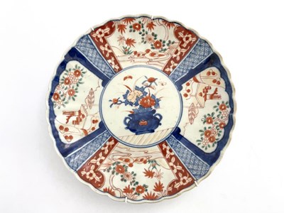 Lot 444 - Two Japanese imari plates, one rounded and...