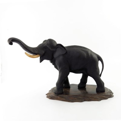 Lot 446 - A Japanese bronze elephant by Genruysai Seiya,...