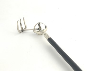 Lot 59 - A George V toasting fork, with ebonised...