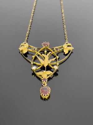 Lot 176 - A 9ct gold garnet and seed pearl openwork...