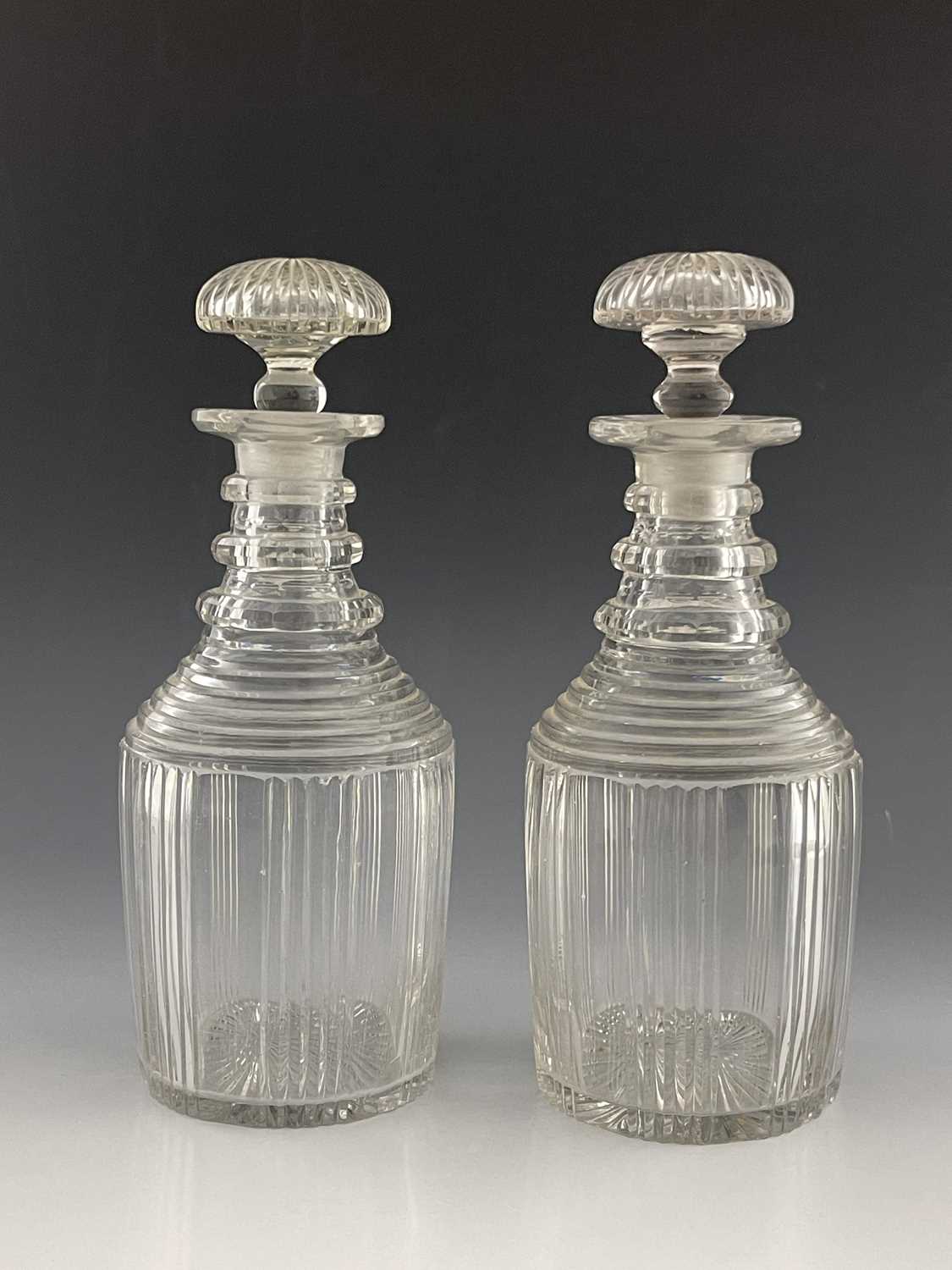 Lot 481 A pair of cut glass cylinder decanters