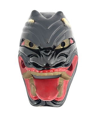 Lot 814 - A Japanese pottery and lacquer Noh mask of...