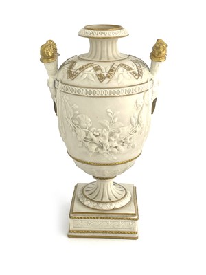 Lot 1005 - A Copeland Parian urn, twin handled footed...