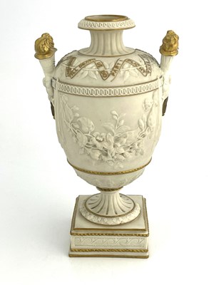 Lot 1005 - A Copeland Parian urn, twin handled footed...