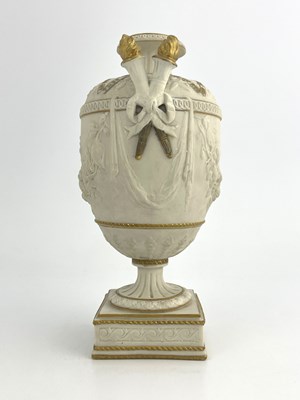 Lot 1005 - A Copeland Parian urn, twin handled footed...