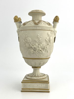 Lot 1005 - A Copeland Parian urn, twin handled footed...