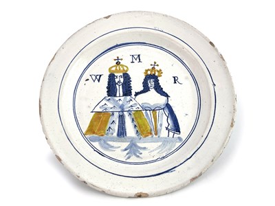 Lot 1045 - A William and Mary Delft commemorative plate,...