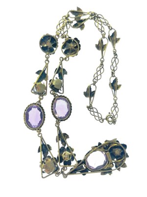 Lot 211 - An Arts and Crafts silver gilt and amethyst...