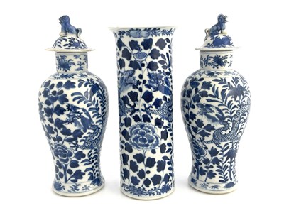 Lot 559 - A Chinese blue and white three piece garniture,...