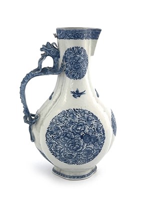 Lot 573 - A Chinese blue and white ewer, lobed baluster...