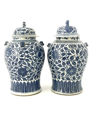 Lot 583 - A lage pair of Chinese blue and white temple...