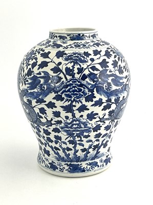 Lot 568 - A Chinese blue and white temple vase, inverse...