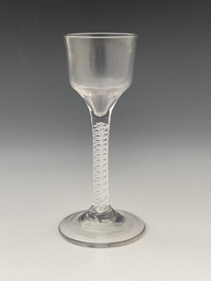 Lot 440 - An opaque twist wine glass, circa 1760, the...