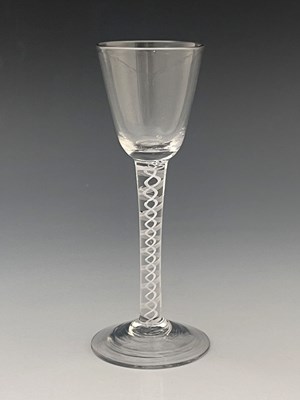 Lot 439 - An opaque twist wine glass, circa 1760, the...