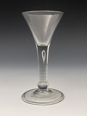 Lot 450 - A basal knopped wine glass, circa 1740, the...