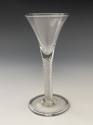 Lot 447 - An air twist wine glass, circa 1750, the...