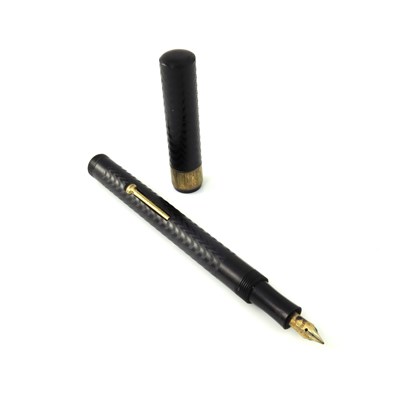 Lot 220 - A Brittanic fountain pen, engine turned black...