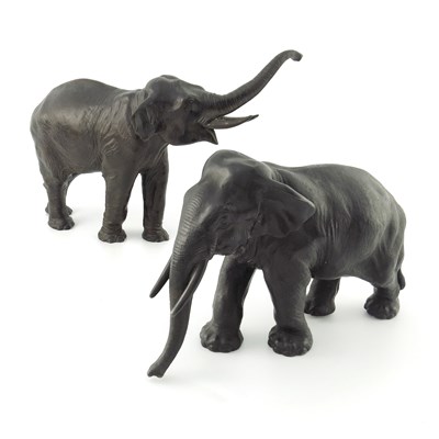 Lot 718 - Two German bronzed metal figures of elephants,...