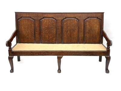 Lot 600 - A George III country oak hall settle, circa...