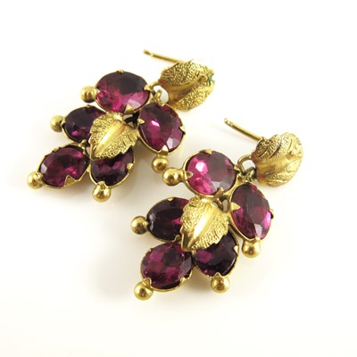 Lot 172 - A pair of purple gem set multi drop earrings,...