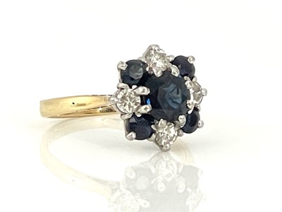 Lot 197 - An 18ct gold,Sapphire and diamond set cluster...